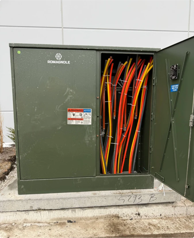 Outdoor high-voltage transformer installation for industrial site in Wisconsin by T-TECH Power.